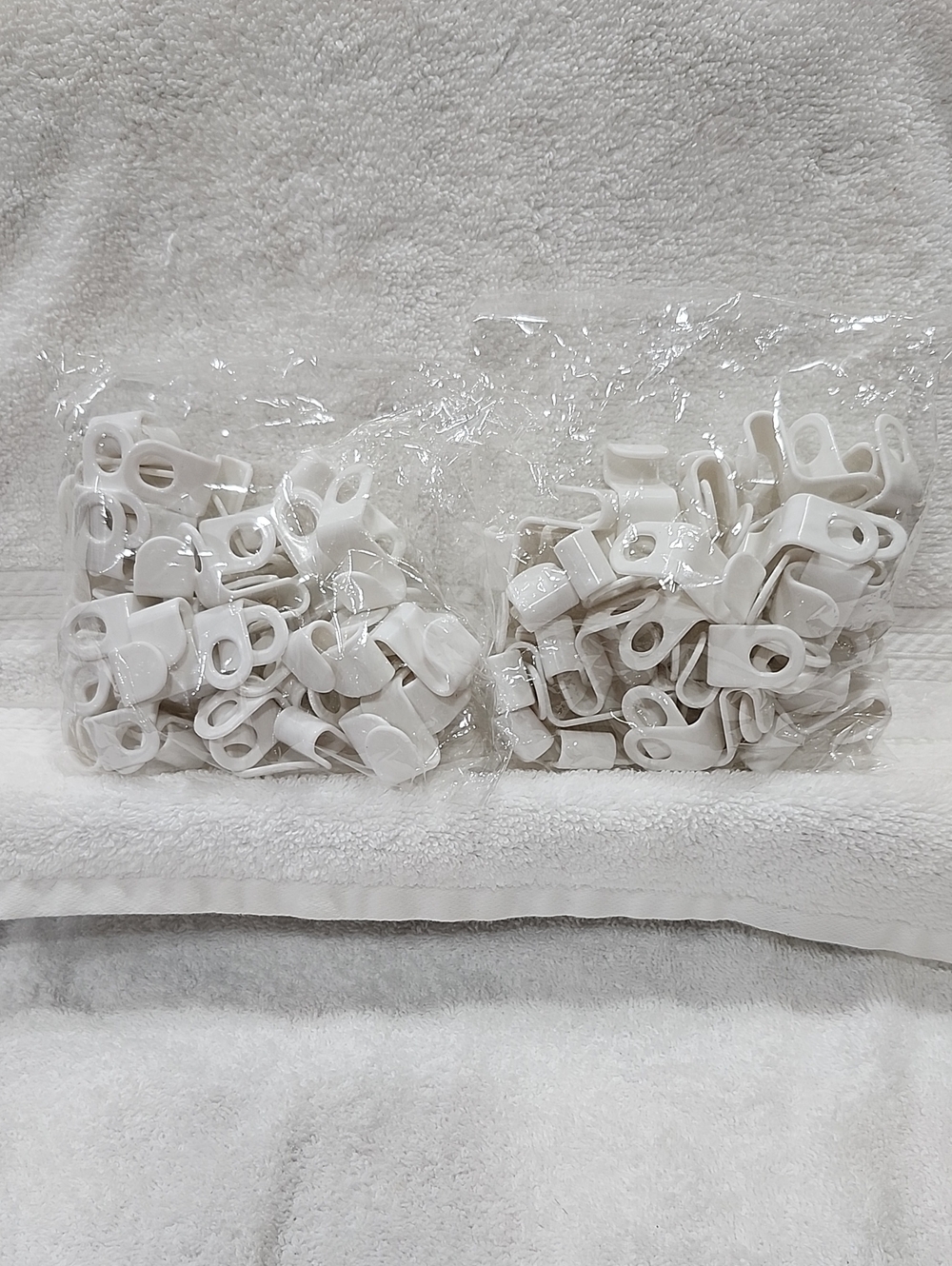 Bundle of White Plastic Hanger Connection Hooks- 2 Packs